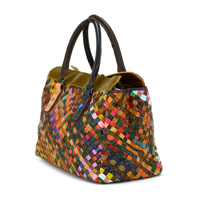 A large, colorful women's handbag, perfect for travel