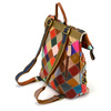 A unique leather backpack with a colorful mosaic pattern