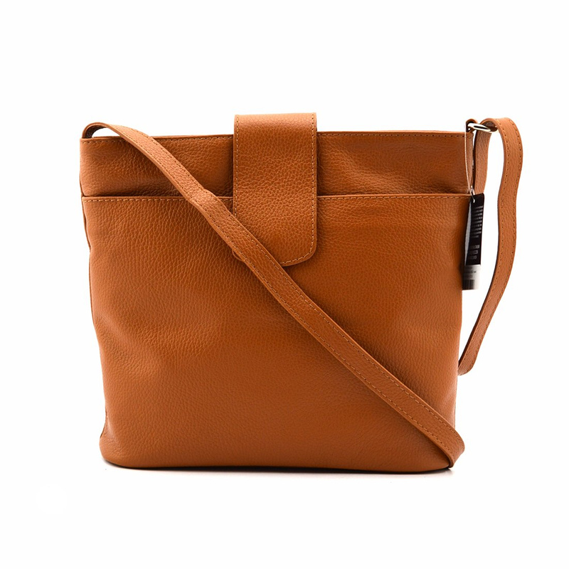 Women's leather messenger bag fastened over the shoulder