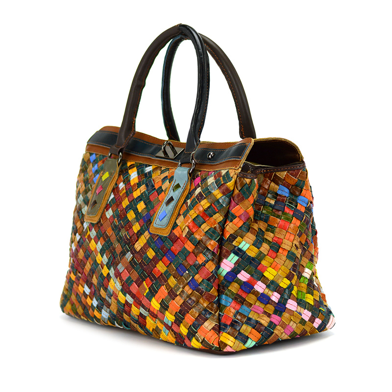 A large, colorful women's handbag, perfect for travel