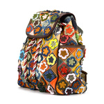 Colorful women's backpack with a mosaic pattern and flowers