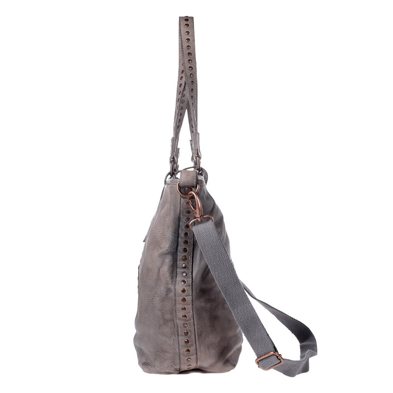 Studded shoulder bag for women by DUDU made in washed leather garment-dyed with studs and detachable strap. Double leather handle.