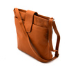 Women's leather messenger bag fastened over the shoulder