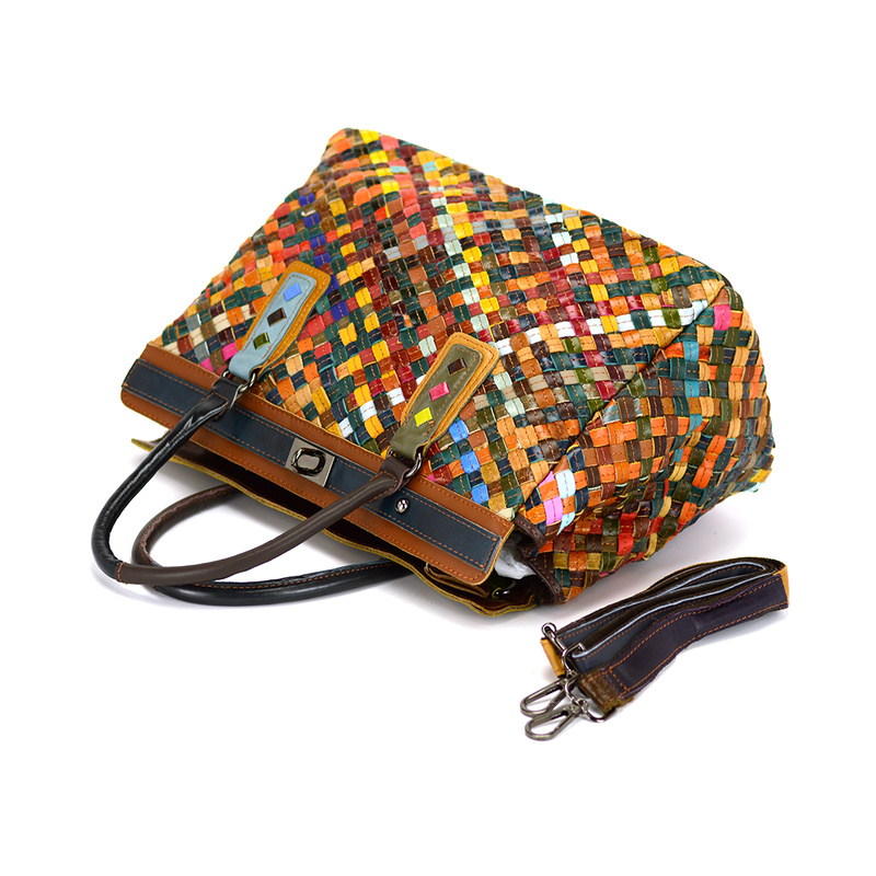 A large, colorful women's handbag, perfect for travel