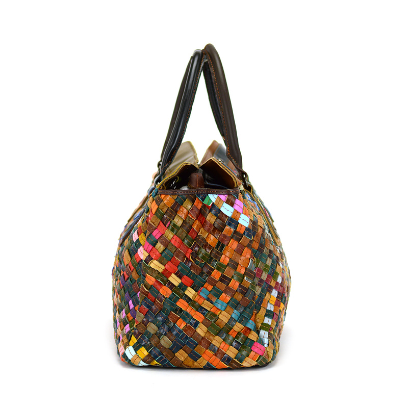 A large, colorful women's handbag, perfect for travel