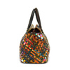 A large, colorful women's handbag, perfect for travel