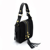 Elegant feminine leather messenger bag with fringe