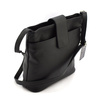 Women's leather messenger bag fastened over the shoulder