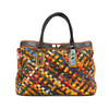 A large, colorful women's handbag, perfect for travel