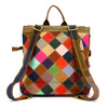 A unique leather backpack with a colorful mosaic pattern