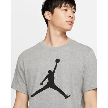 Koszulka T-shirt marki Nike model NIKE JORDAN Jumpman kolor Szary. Odzież męska. Sezon: Cały rok